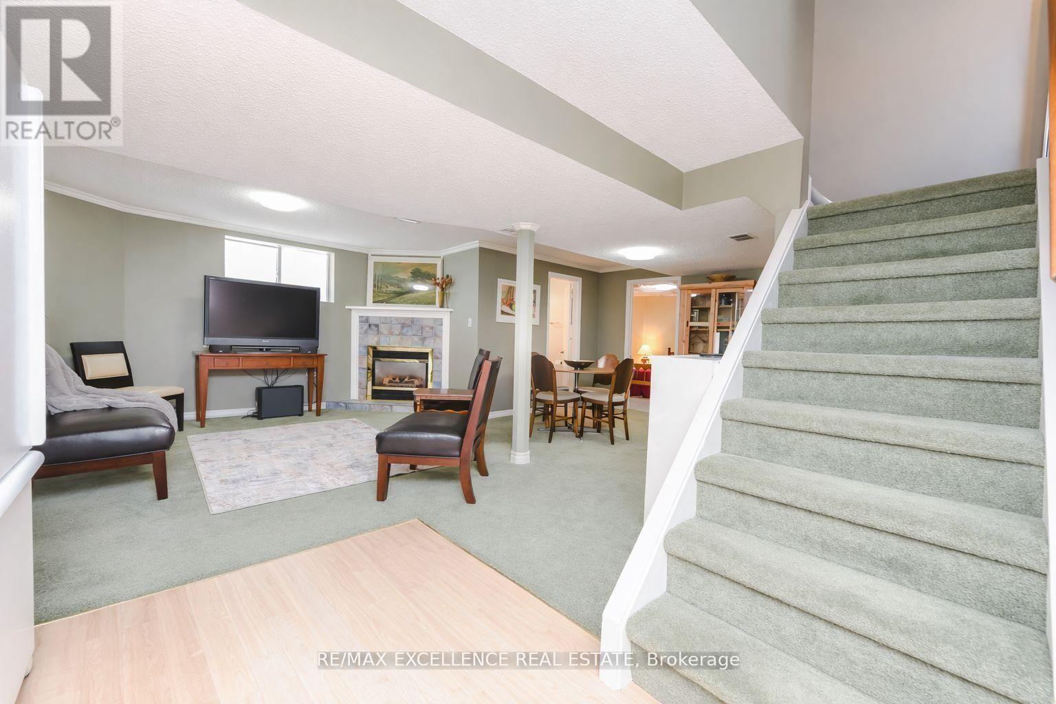 62 Atkins Circle, Brampton, ON - Indoor Photo Showing Other Room With Fireplace