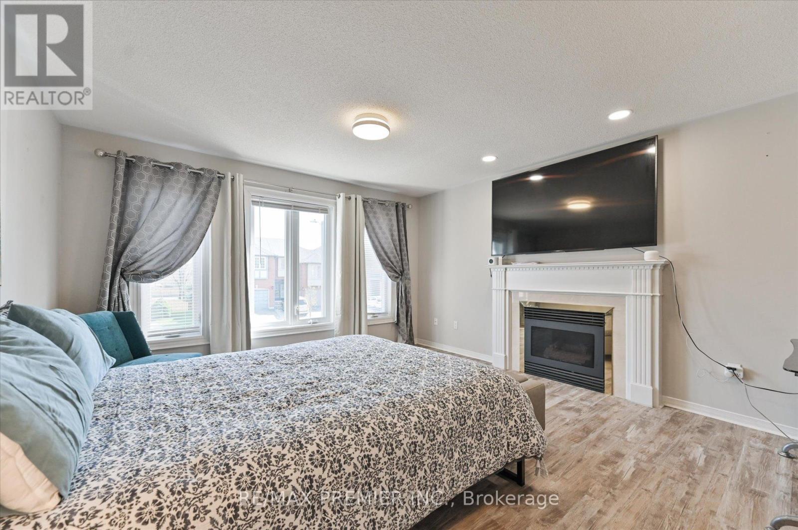 60 Tumbleweed Court, Vaughan, ON - Indoor Photo Showing Bedroom With Fireplace