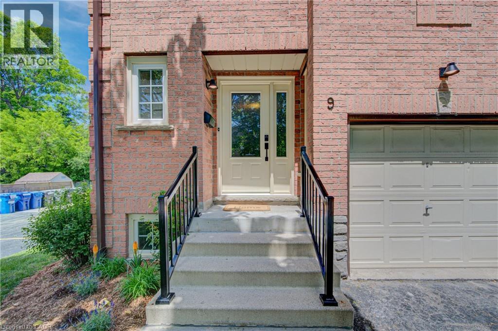 Garage with inside entry into the home - 375 Holiday Inn Drive Unit# 9, Cambridge, ON - Outdoor With Exterior
