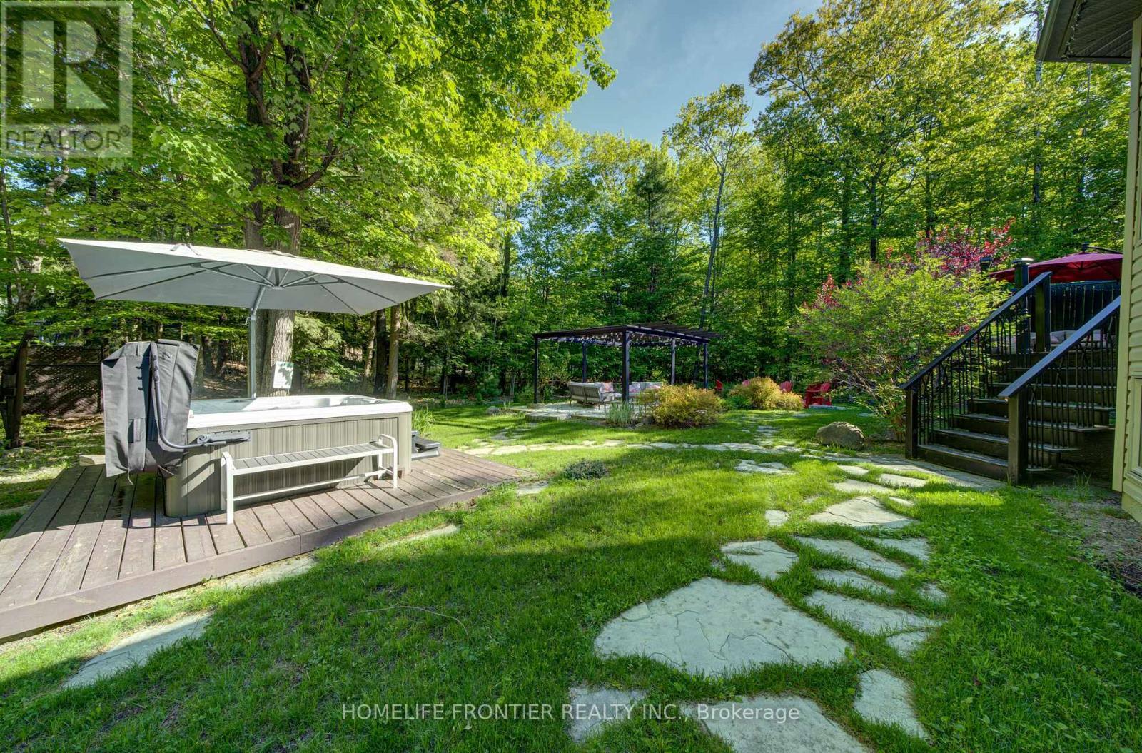 42 Forest Circle, Tiny, ON - Outdoor With Deck Patio Veranda With Backyard