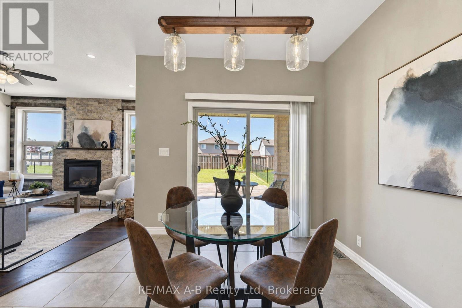 70 Kenton Street, West Perth (Mitchell), ON - Indoor Photo Showing Dining Room With Fireplace