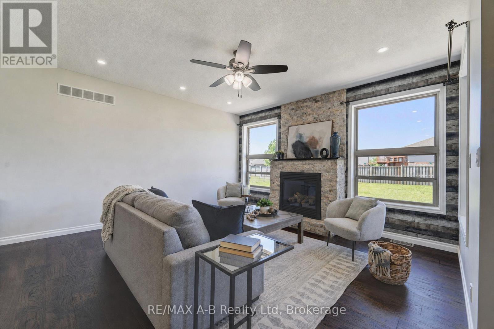 70 Kenton Street, West Perth (Mitchell), ON - Indoor Photo Showing Other Room With Fireplace