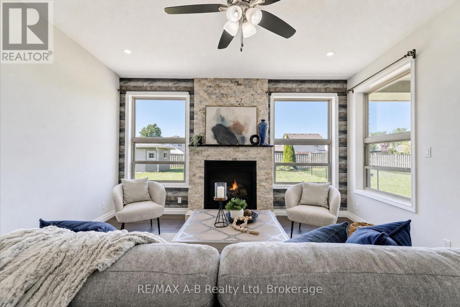 70 Kenton Street, West Perth (Mitchell), ON - Indoor Photo Showing Other Room With Fireplace