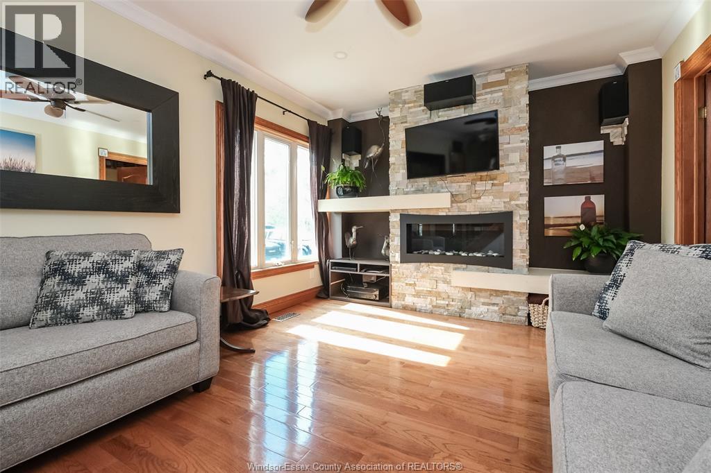 458 John M, Windsor, ON - Indoor Photo Showing Living Room With Fireplace