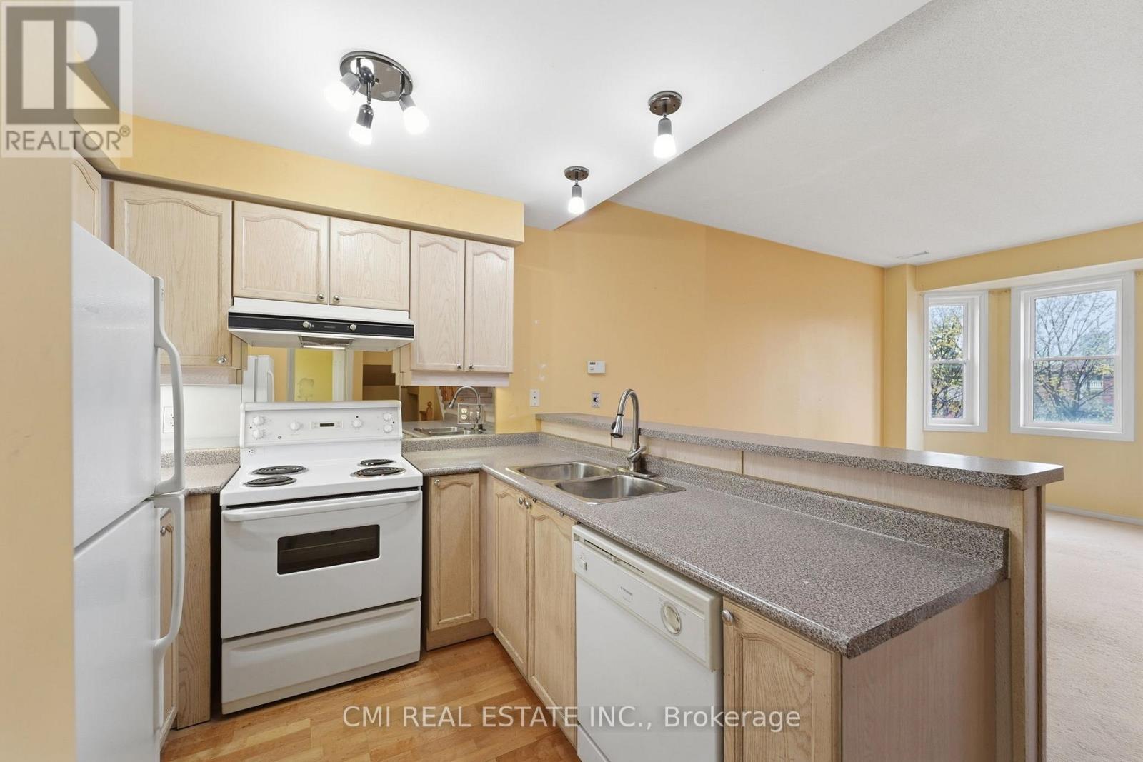 164 - 760 Lawrence Avenue W, Toronto, ON - Indoor Photo Showing Kitchen With Double Sink