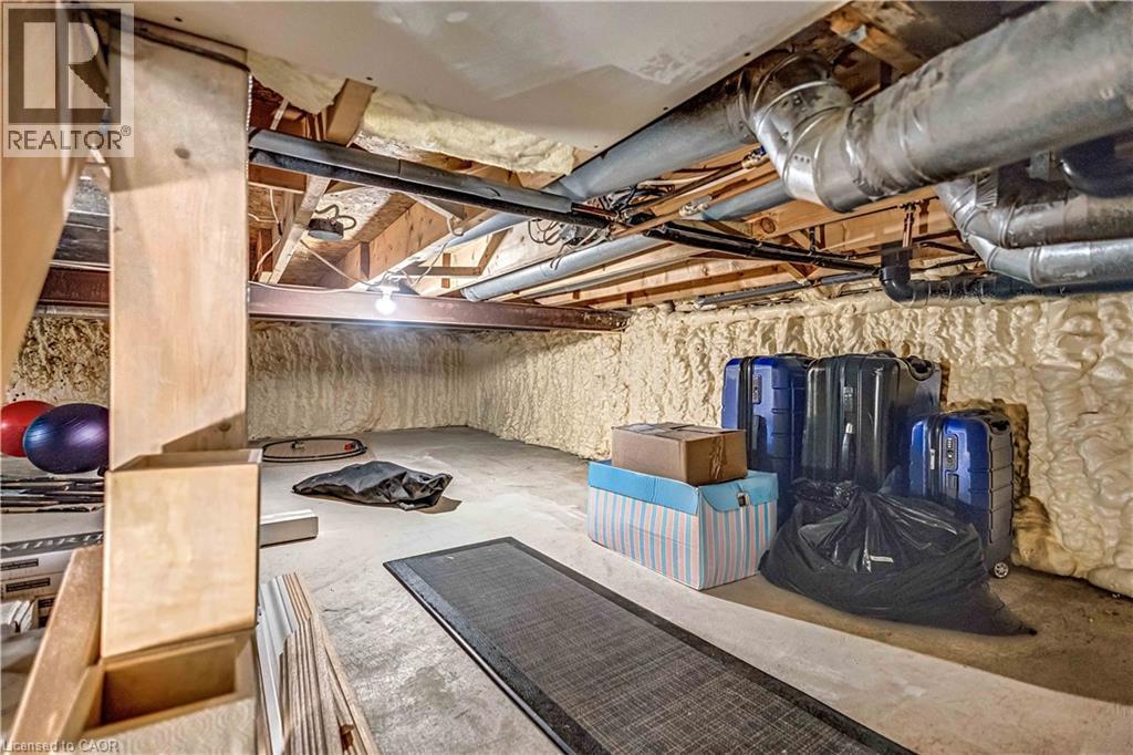 Unfinished basement offering ample storage space, exposed ductwork, and spray foam insulation - 640 Acadia Drive, Hamilton, ON