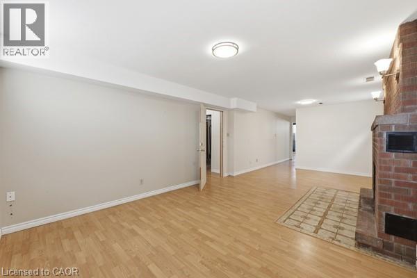 957 Stone Church Road E, Hamilton, ON - Indoor Photo Showing Other Room With Fireplace