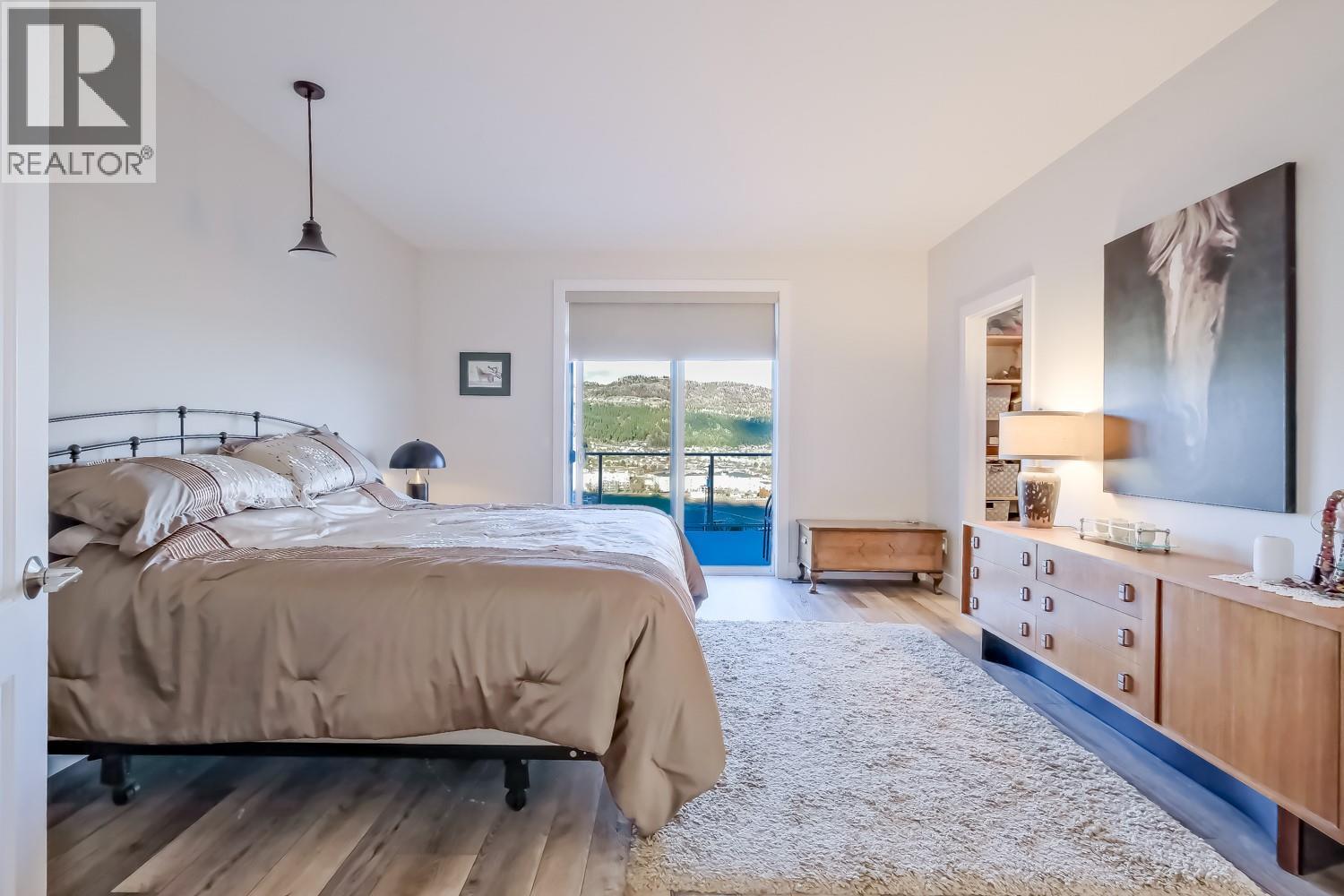 Primary Bedroom - 2241 Rojem Road, Kelowna, BC - Indoor Photo Showing Bedroom