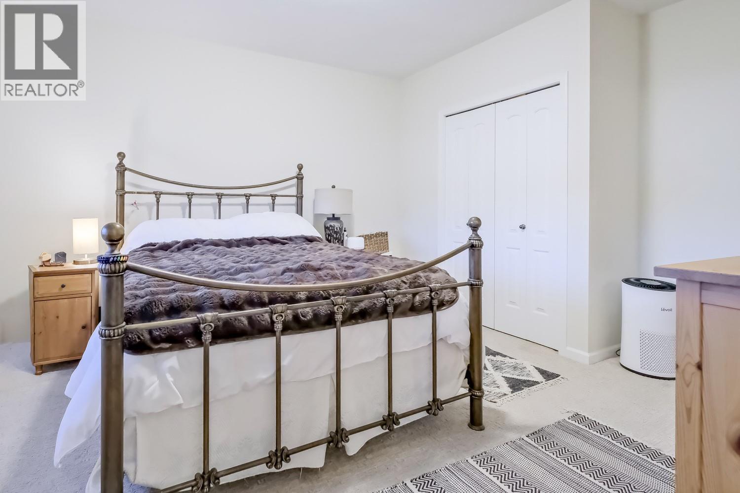 Lower Level Bedroom - 2241 Rojem Road, Kelowna, BC - Indoor Photo Showing Bedroom
