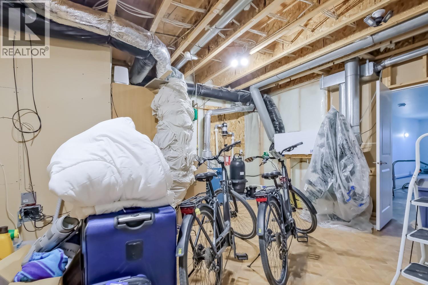 Basement Storage - 2241 Rojem Road, Kelowna, BC - Indoor Photo Showing Basement