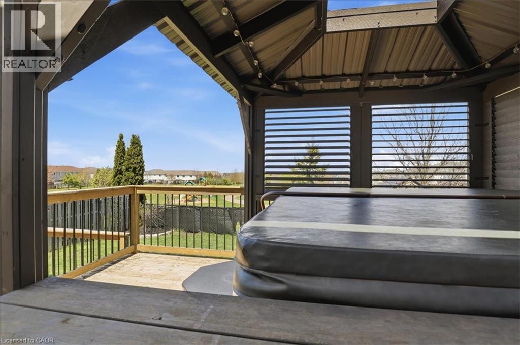 Covered outdoor structure featuring an integrated spa - 136 Carpenter Road, Cambridge, ON - Outdoor With Deck Patio Veranda With Exterior