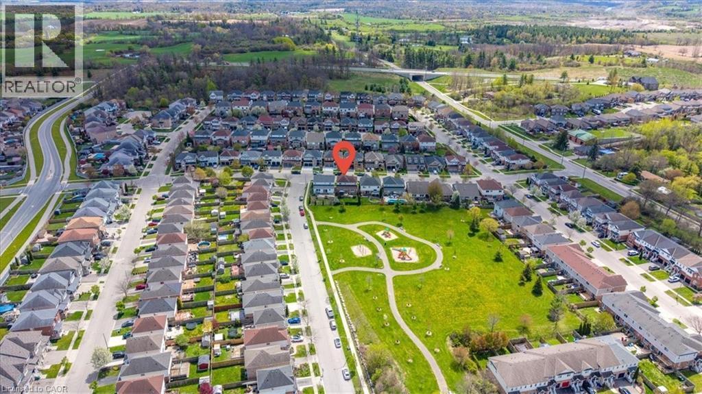 Aerial perspective showcasing a residential development with varied housing styles - 136 Carpenter Road, Cambridge, ON - With View