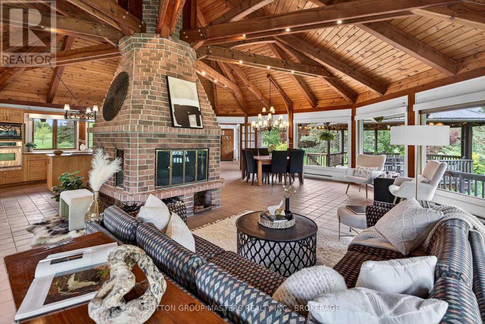 314 Baseline Road, Frontenac Islands (Howe Island), ON - Photo Showing Living Room With Fireplace