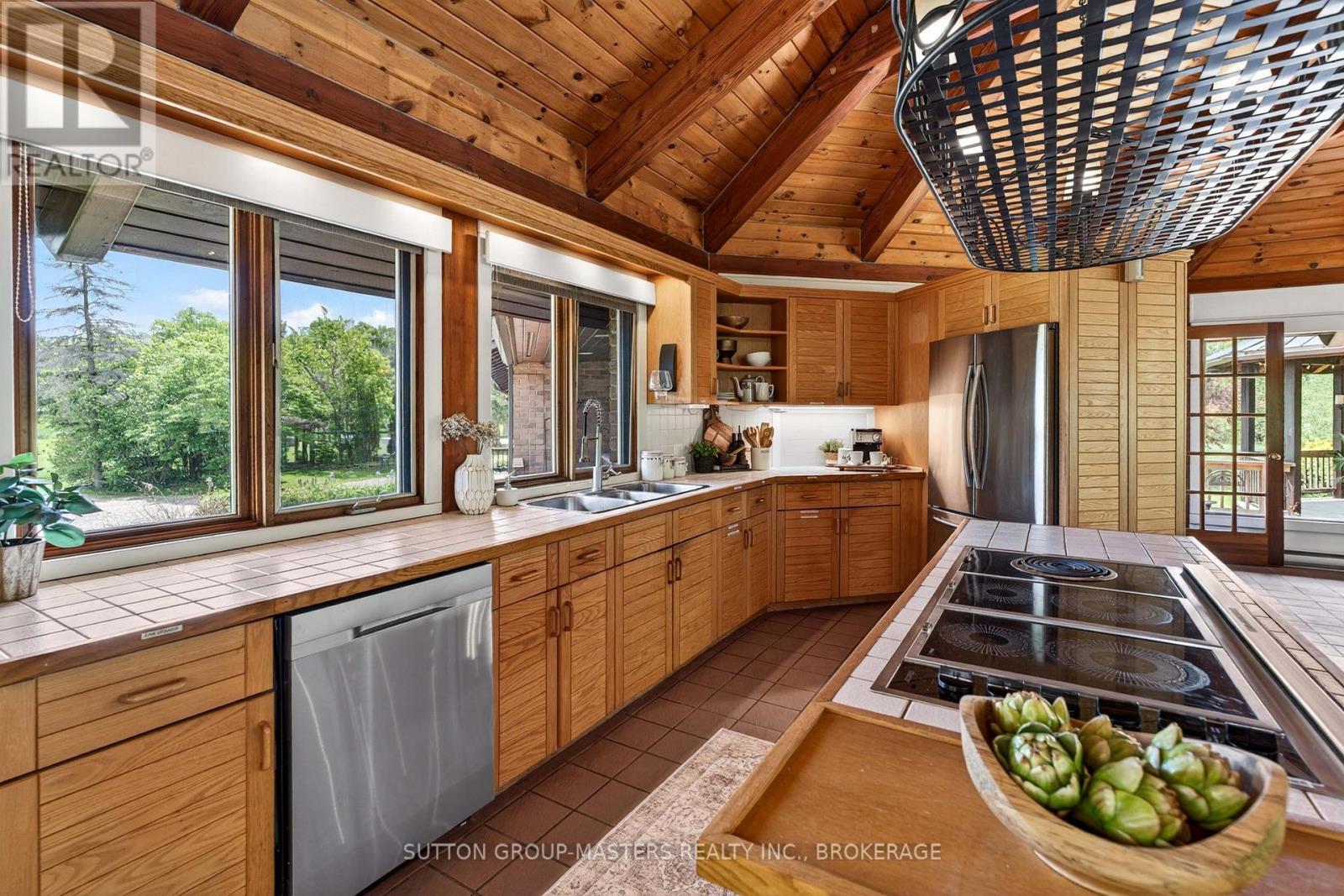 314 Baseline Road, Frontenac Islands (Howe Island), ON - Indoor Photo Showing Kitchen With Double Sink