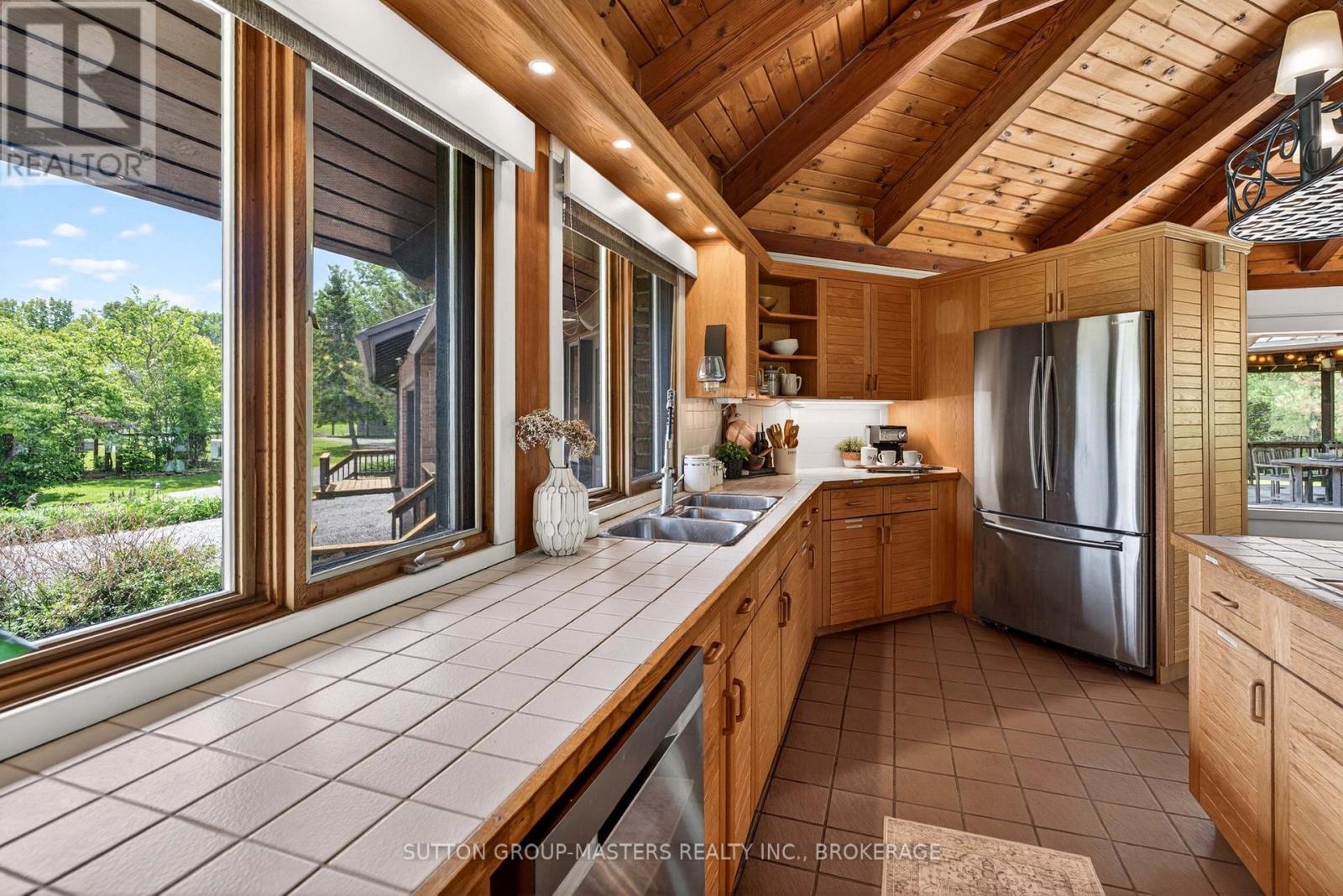 314 Baseline Road, Frontenac Islands (Howe Island), ON - Indoor Photo Showing Kitchen With Double Sink