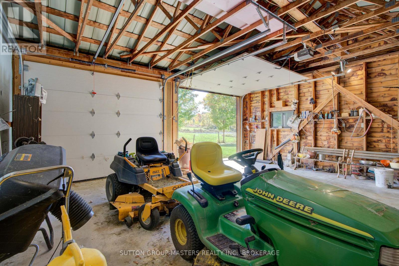 314 Baseline Road, Frontenac Islands (Howe Island), ON - Indoor Photo Showing Garage