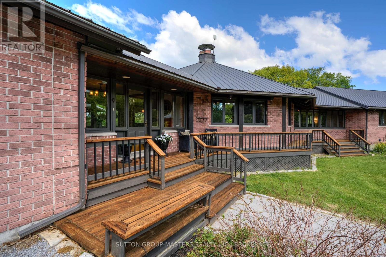 314 Baseline Road, Frontenac Islands (Howe Island), ON - Outdoor With Deck Patio Veranda With Exterior