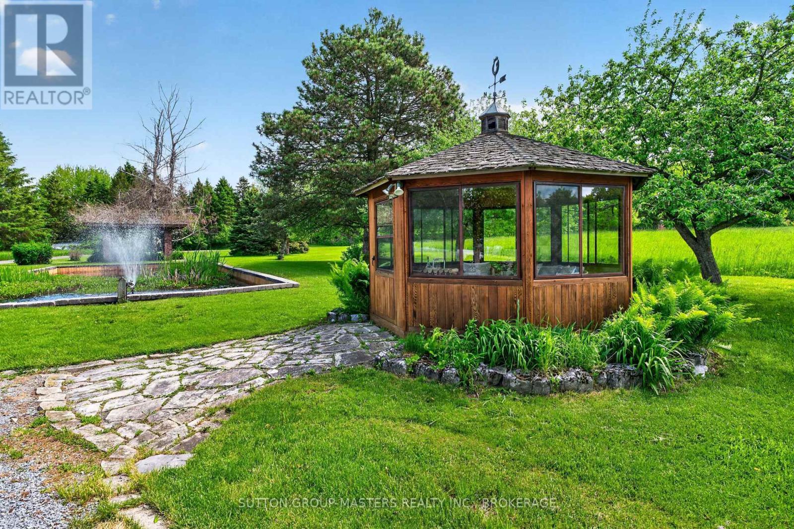 314 Baseline Road, Frontenac Islands (Howe Island), ON - Outdoor With Backyard