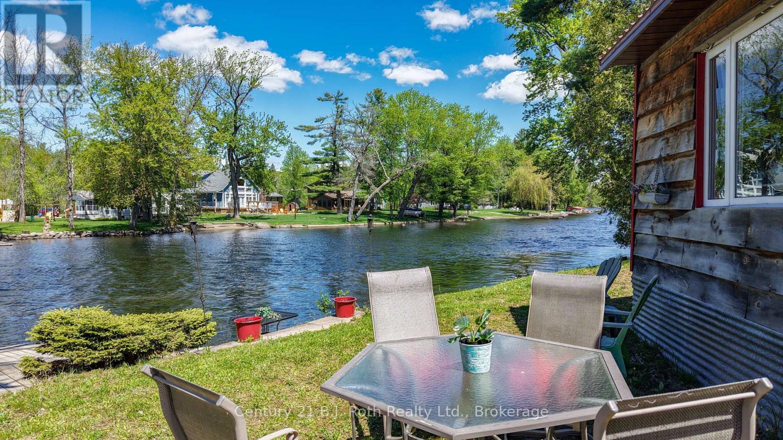 Outdoor dining! - 4258 Canal Road, Severn, ON - Outdoor With Body Of Water With Deck Patio Veranda With View