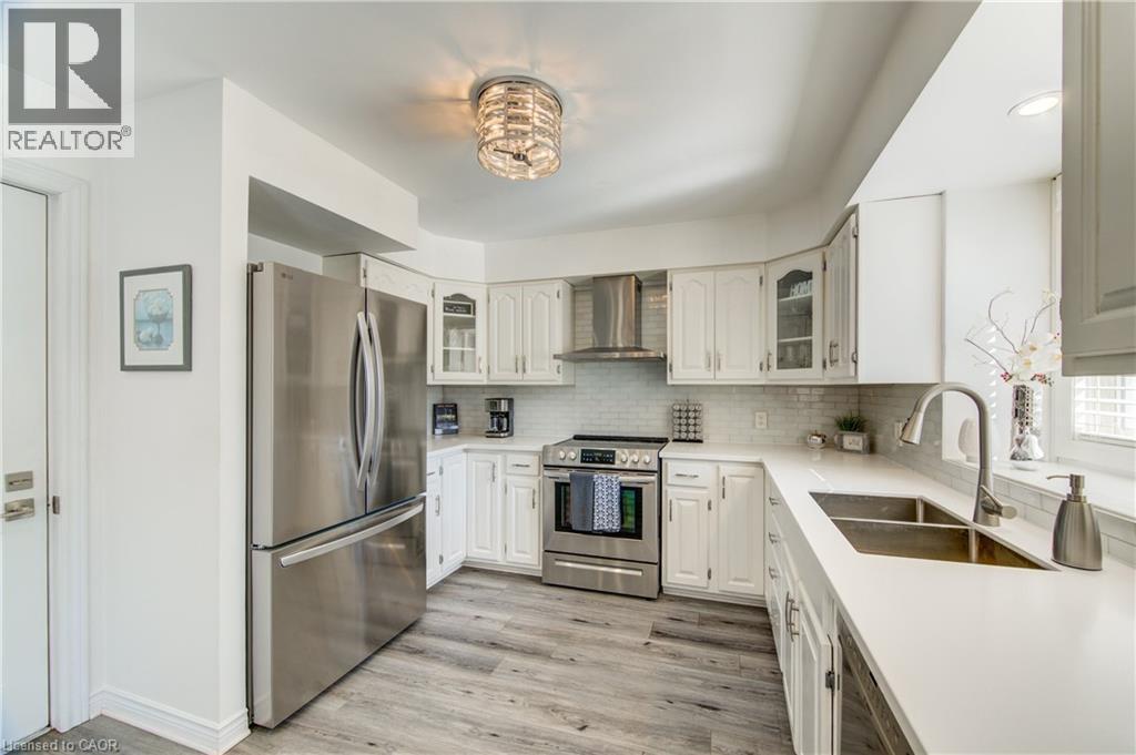 102 Allen Street, Tillsonburg, ON - Indoor Photo Showing Kitchen With Double Sink