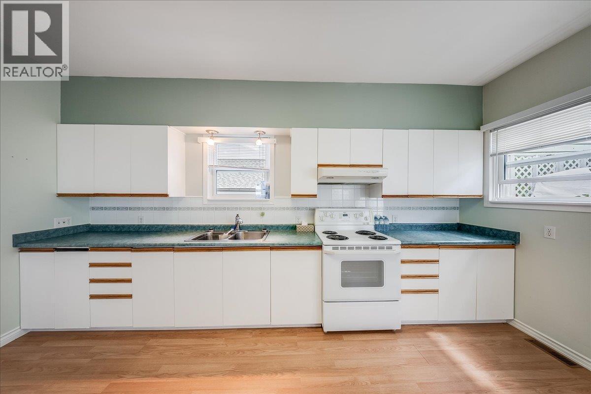 426 Austad Lane, Trail, BC - Indoor Photo Showing Kitchen With Double Sink