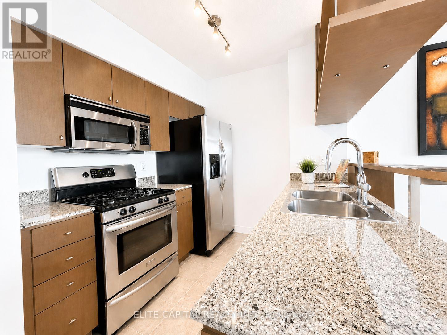 1008 - 10 Navy Wharf Court, Toronto, ON - Indoor Photo Showing Kitchen With Double Sink