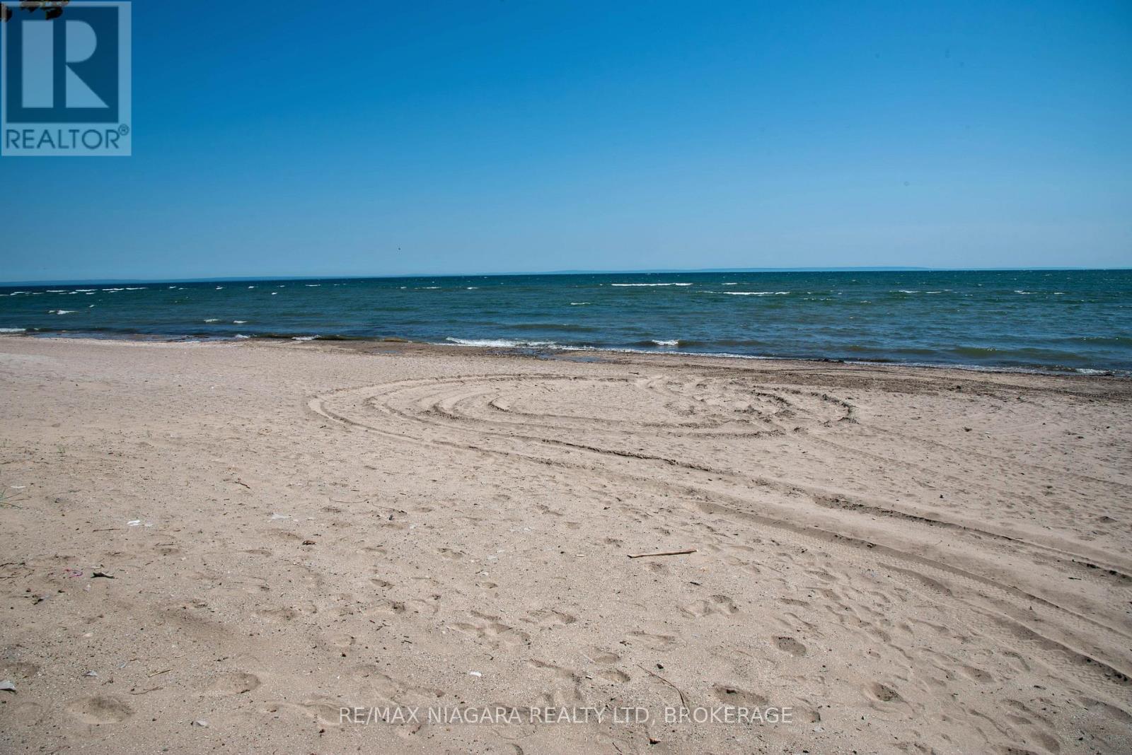 Withing walking distance to a Beautiful Sand Beach - 2868 June Road, Port Colborne (Sherkston), ON - Outdoor With Body Of Water With View
