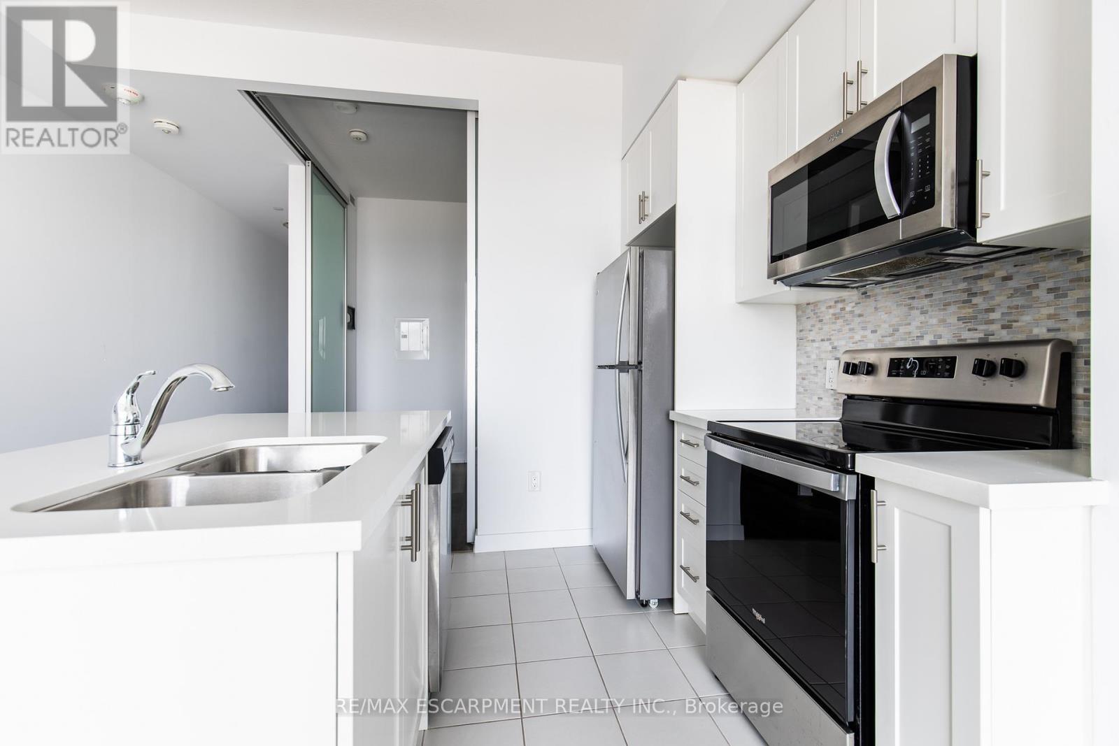 416 - 450 Dundas Street E, Hamilton, ON - Indoor Photo Showing Kitchen With Stainless Steel Kitchen With Double Sink