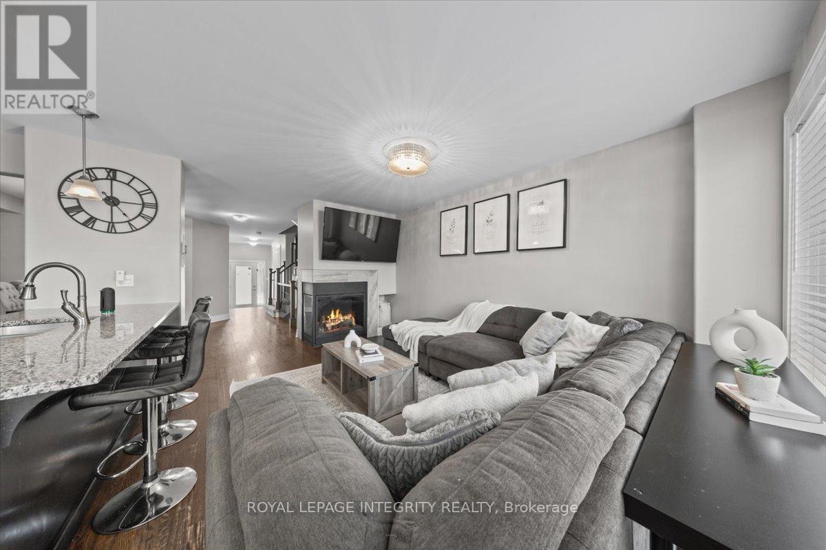 154 Woodhurst Crescent, Ottawa, ON - Indoor Photo Showing Living Room With Fireplace