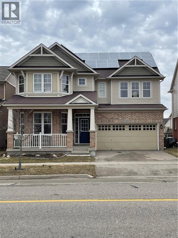 Two-story residence featuring a brick and siding exterior with a two-car garage - 222 Baldwin Drive, Cambridge, ON - Outdoor With Facade