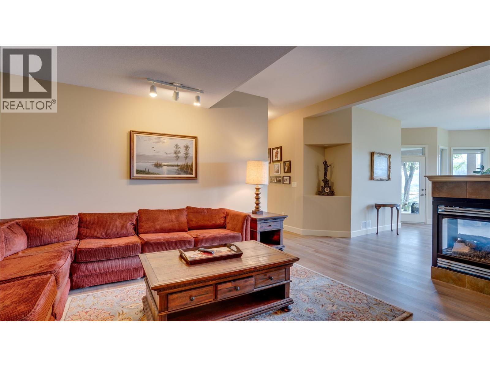 #8 Bayview Heights Lot# 8, Coldstream, BC - Indoor Photo Showing Living Room With Fireplace