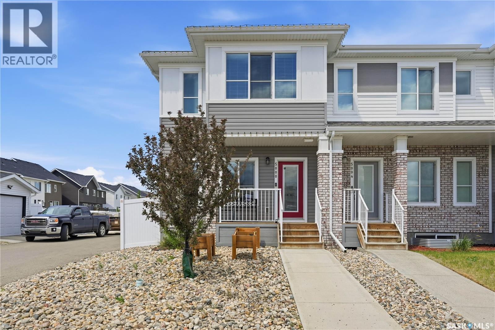 5000 Primrose Green Drive E, Regina, SK - Outdoor With Facade