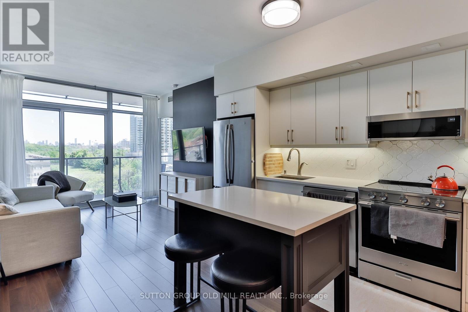 602 - 103 The Queensway, Toronto, ON - Indoor Photo Showing Kitchen With Stainless Steel Kitchen