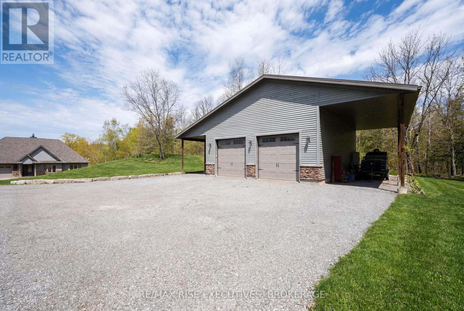 Detached insulated heated Shop custom doors - 1206B Burnt Hills Road, Frontenac (Frontenac South), ON - Outdoor