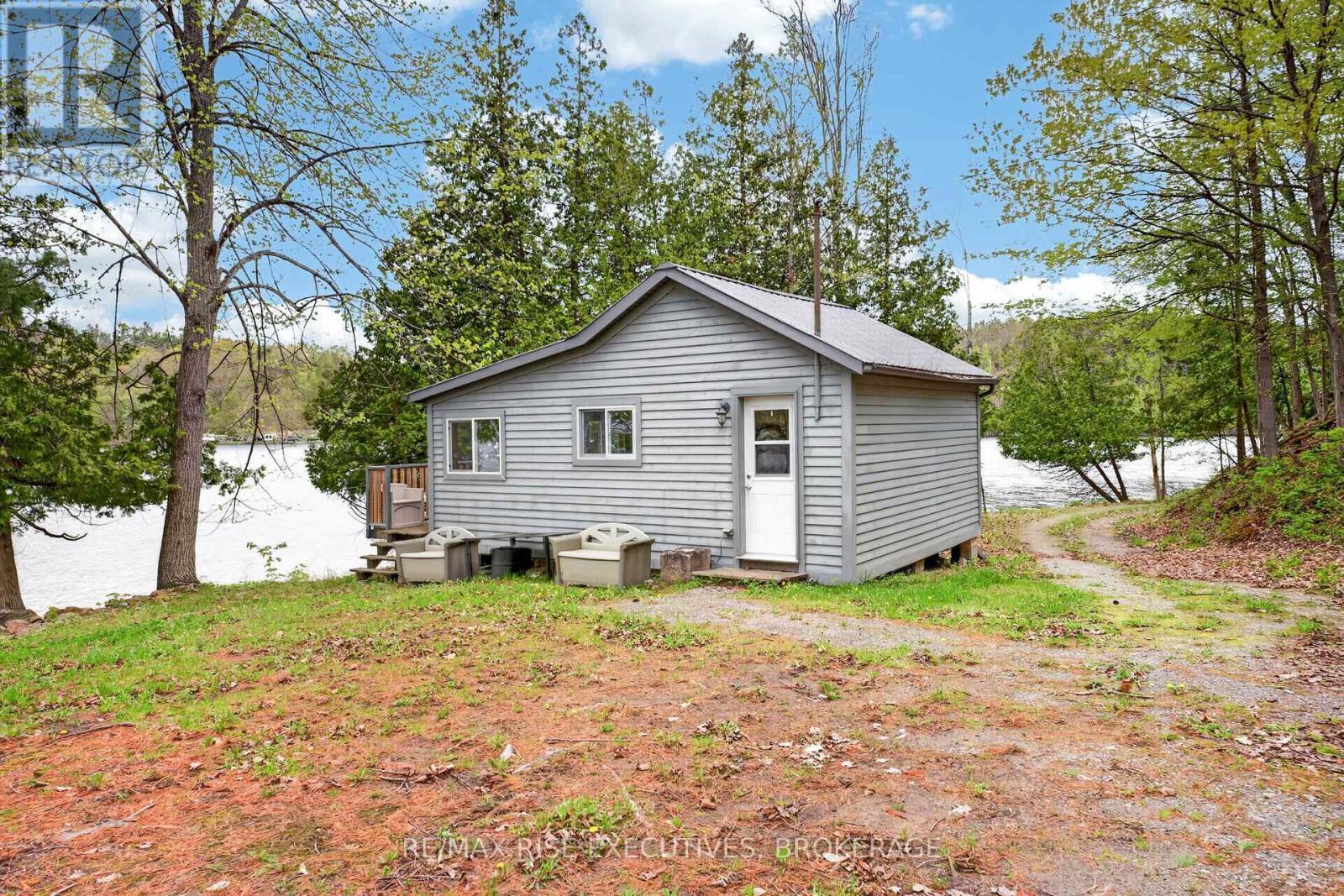 2 Bedroom Bunkie - 1206B Burnt Hills Road, Frontenac (Frontenac South), ON - Outdoor With Body Of Water With View