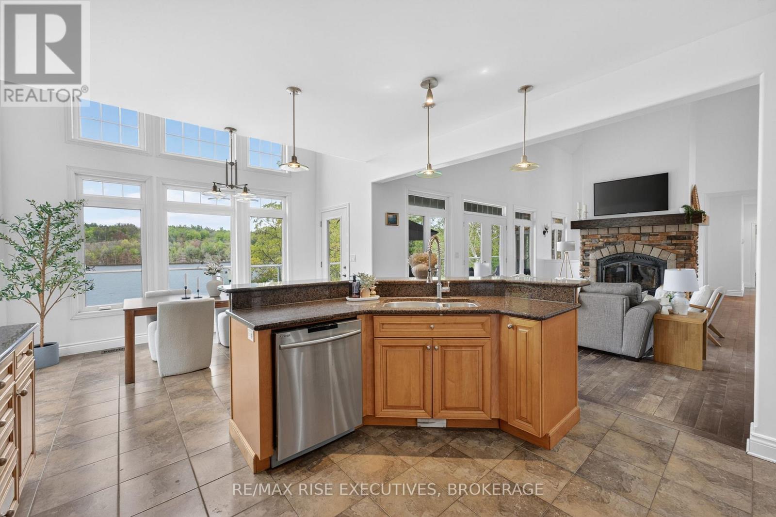 1206B Burnt Hills Road, Frontenac (Frontenac South), ON - Indoor Photo Showing Kitchen With Fireplace With Double Sink