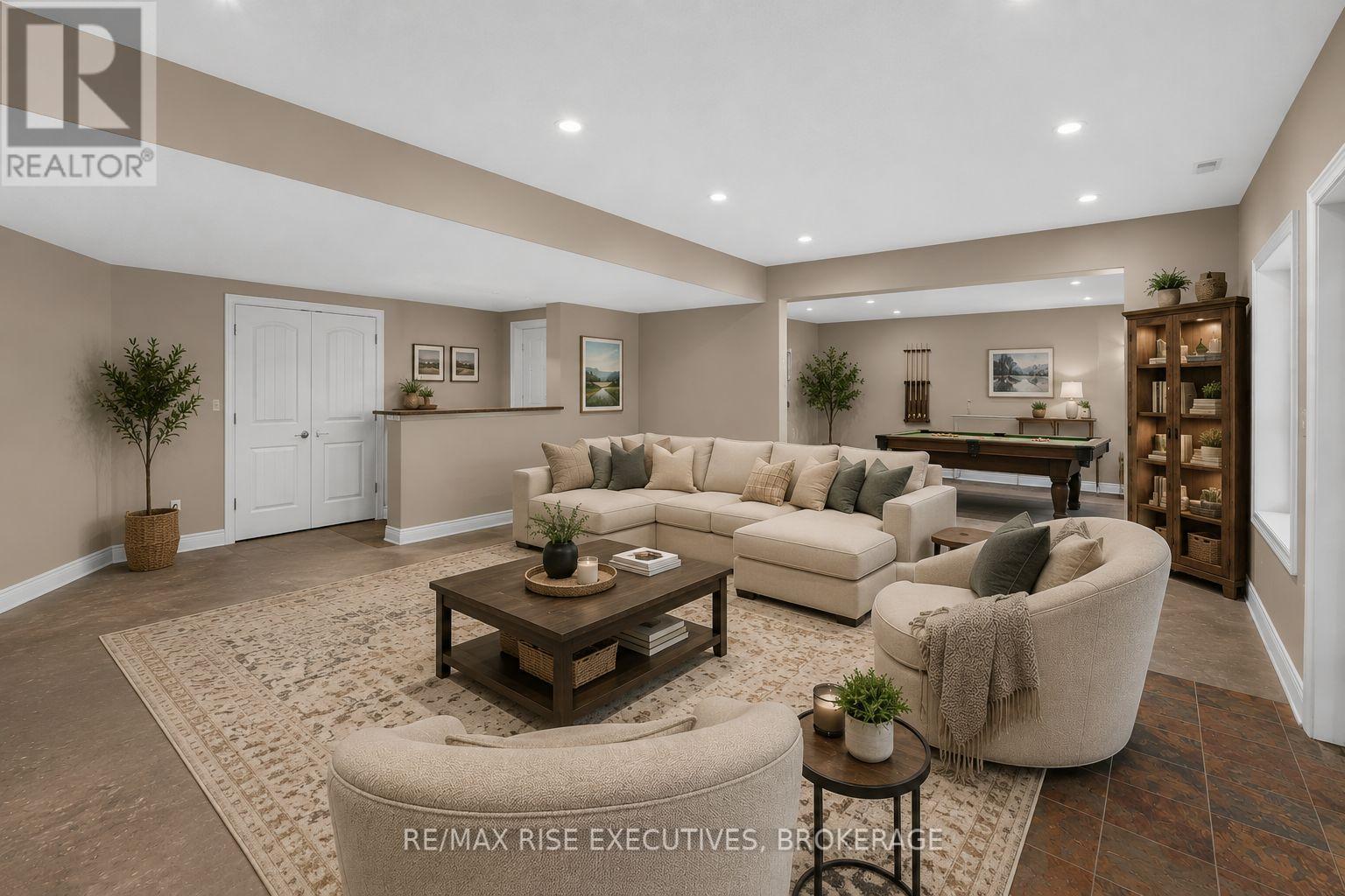 Virtually staged Basement Walkout - 1206B Burnt Hills Road, Frontenac (Frontenac South), ON - Indoor Photo Showing Living Room