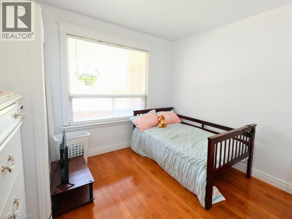 Main Floor Bedroom - 42 Dalhousie Avenue, Hamilton, ON - Indoor Photo Showing Living Room