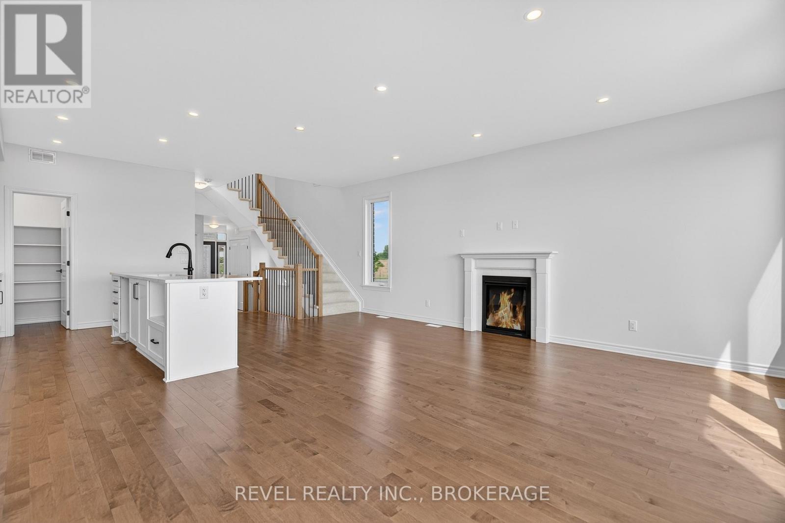 1415 Demers Avenue, Kingston (East Gardiners Rd), ON - Indoor Photo Showing Living Room With Fireplace