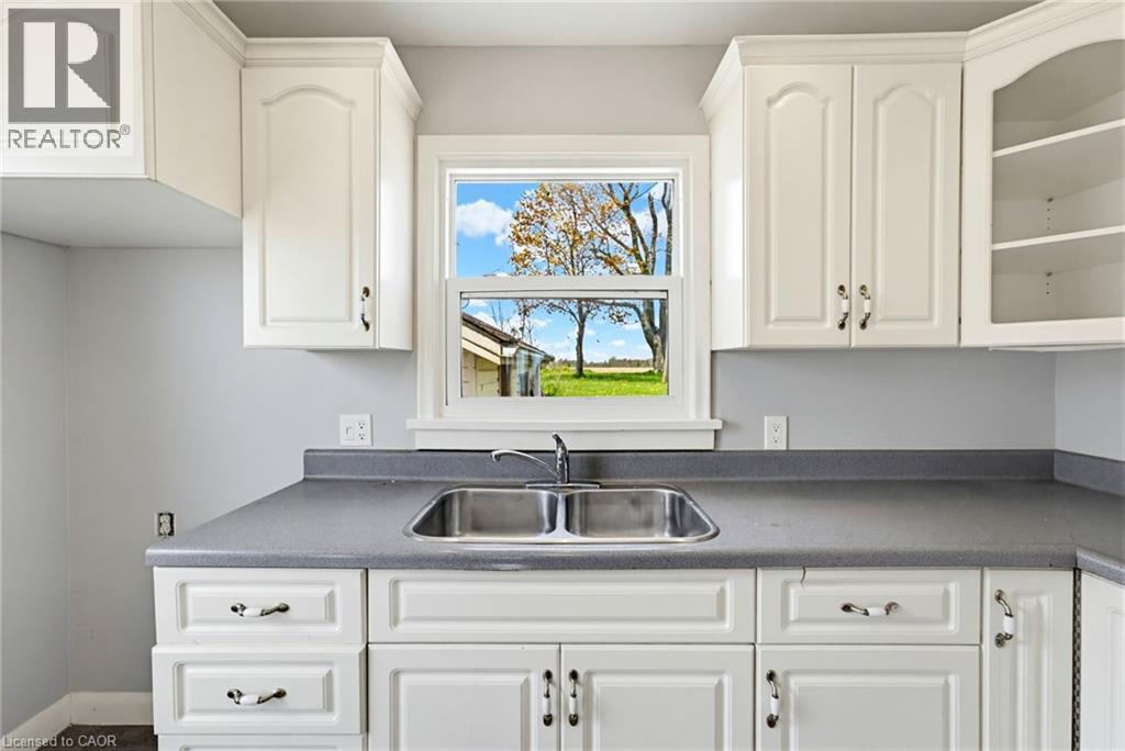 2721 North Shore Road, Lowbanks, ON - Indoor Photo Showing Kitchen With Double Sink
