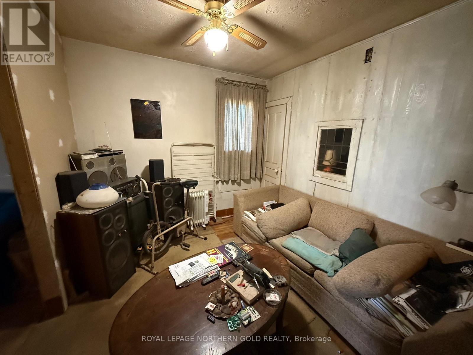 6 Monroe Street, Mcgarry (Virginiatown/Kearns), ON - Indoor Photo Showing Living Room With Fireplace