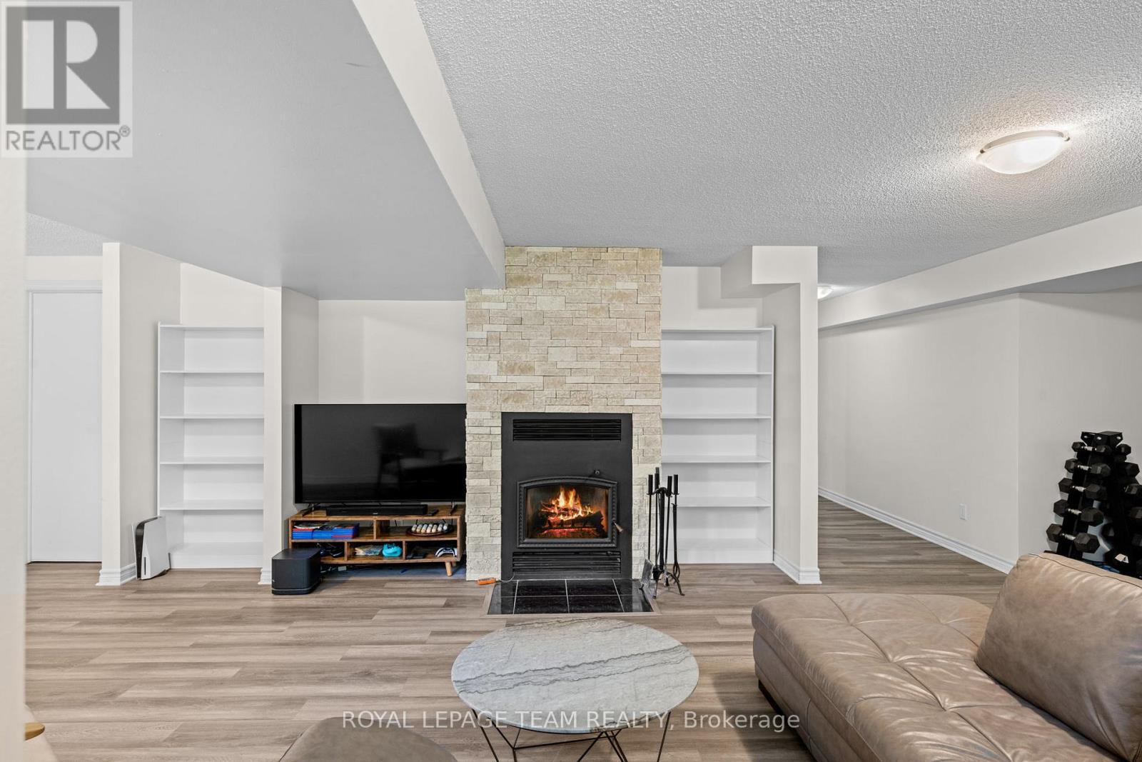 5040 Stonecrest Road, Ottawa, ON - Indoor Photo Showing Living Room With Fireplace