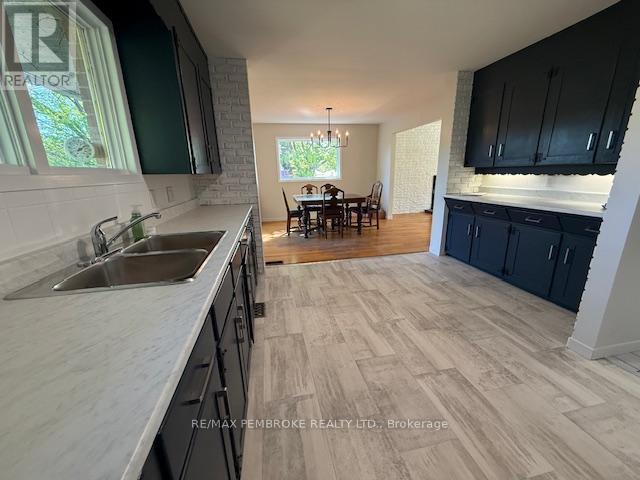 Updated kitchen to open floor plan dining area - 410 Green Lake Road, North Algona Wilberforce, ON