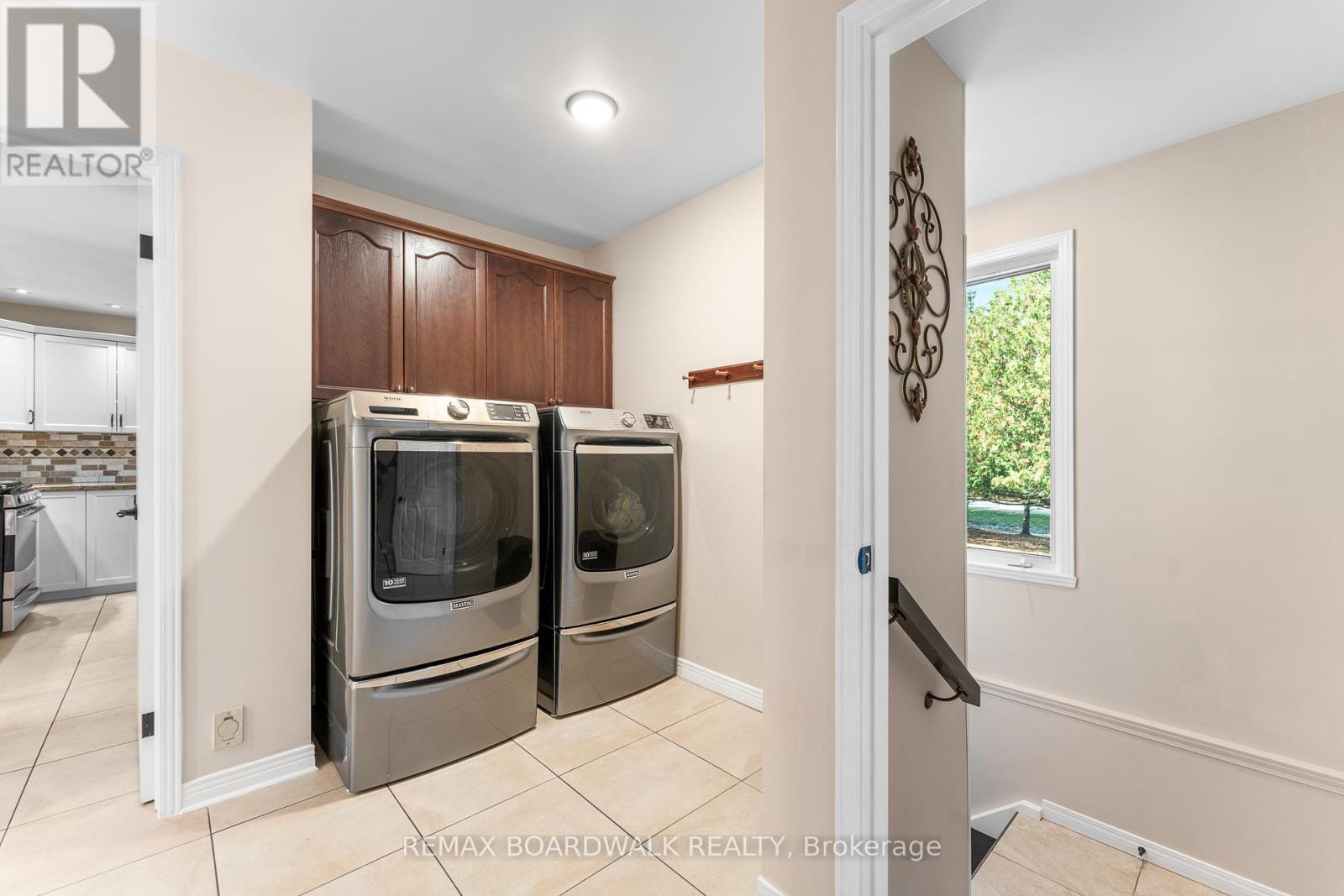 Mudroom Off the Garage Features a Laundry Room - 14 Panandrick View Drive, Ottawa, ON