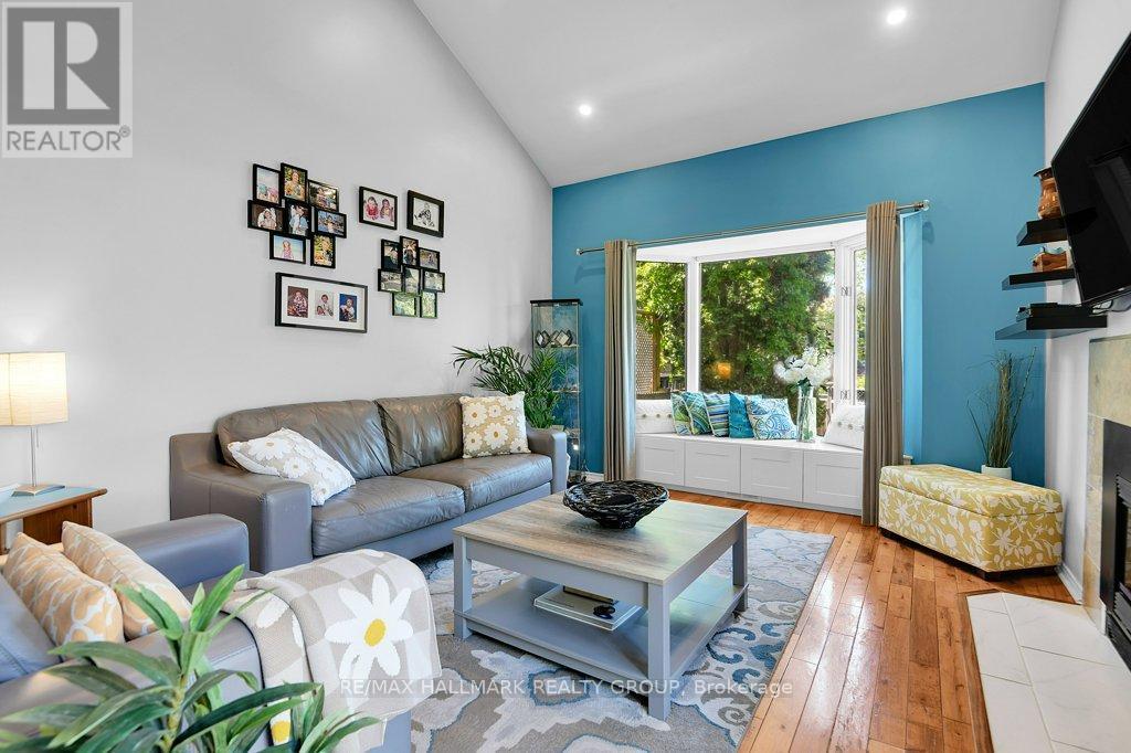 Family room with cathedral ceiling/pot lighting - 22 Terrace Drive, Ottawa, ON