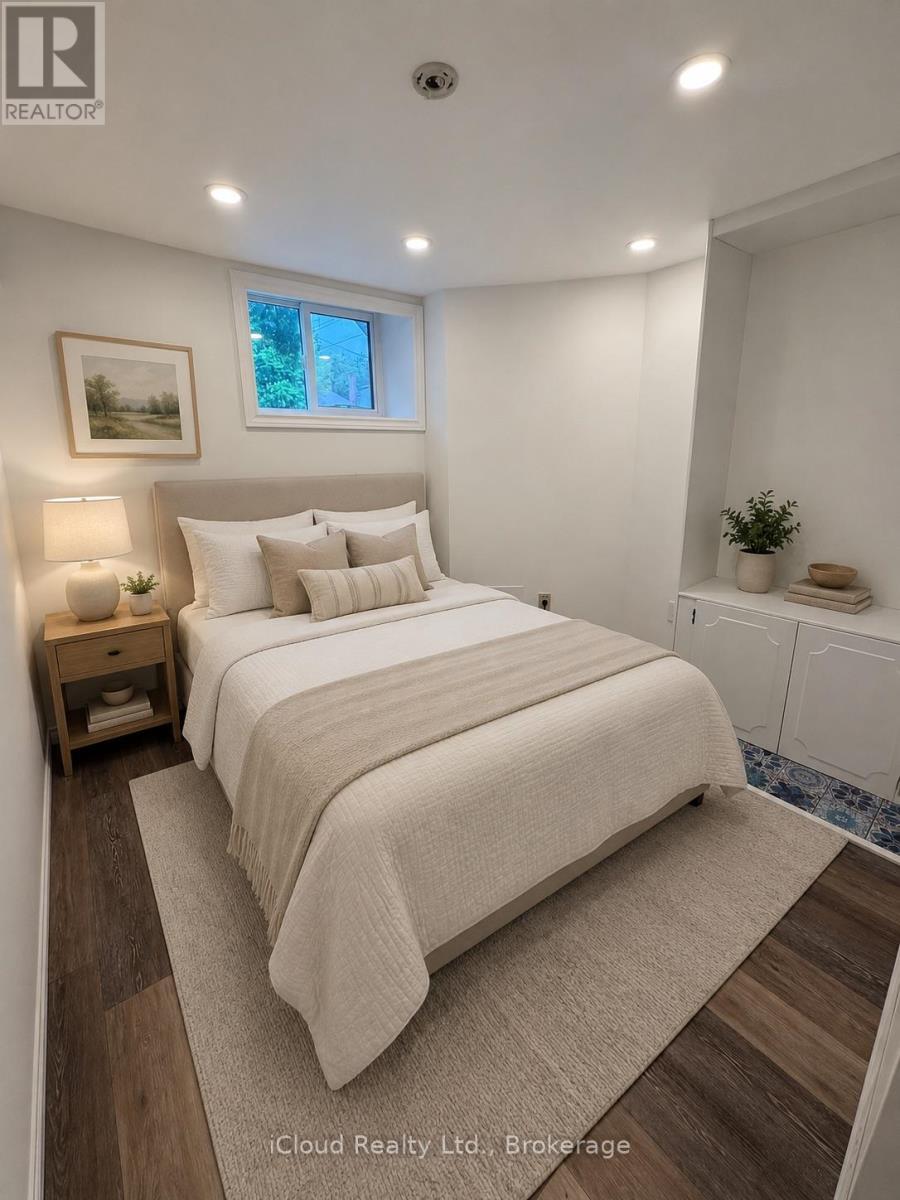 Den as a bedroom with a double bed - 105 East 4Th Street, Hamilton, ON
