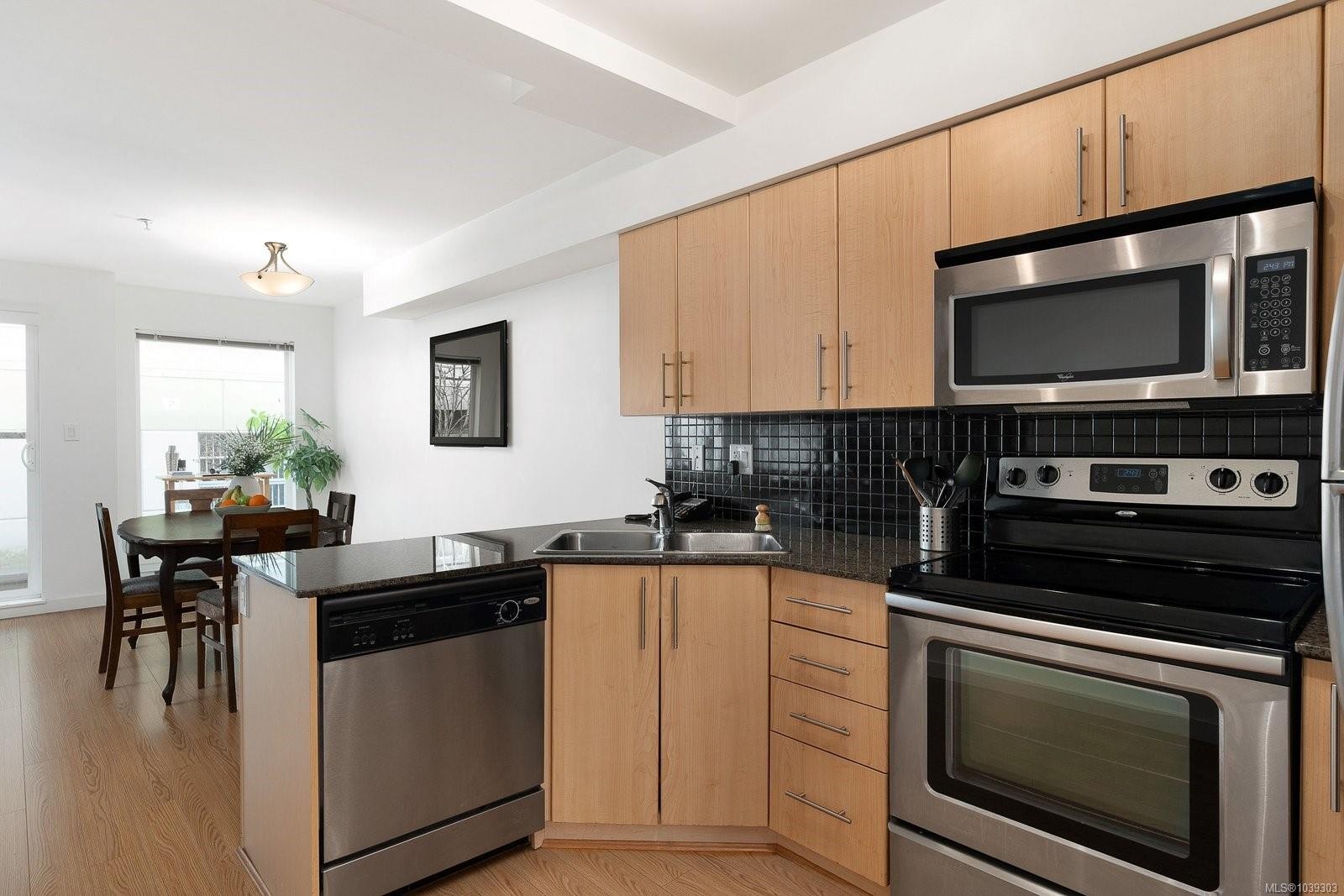 #204-1405 Esquimalt Rd, Esquimalt, BC - Indoor Photo Showing Kitchen With Stainless Steel Kitchen With Double Sink