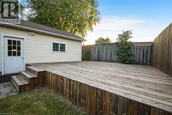 Expansive wooden deck with multi-level access -