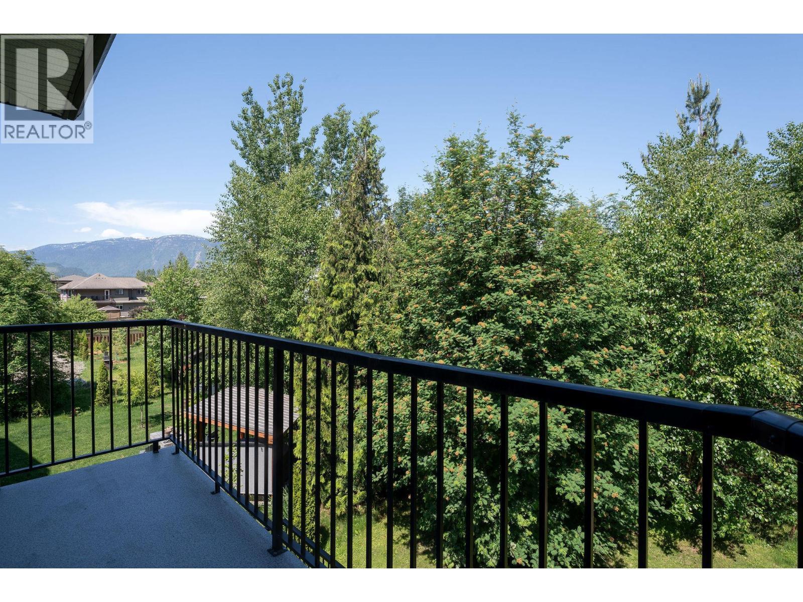 Primary bedroom deck - 1941 Poplar Lane, Revelstoke, BC