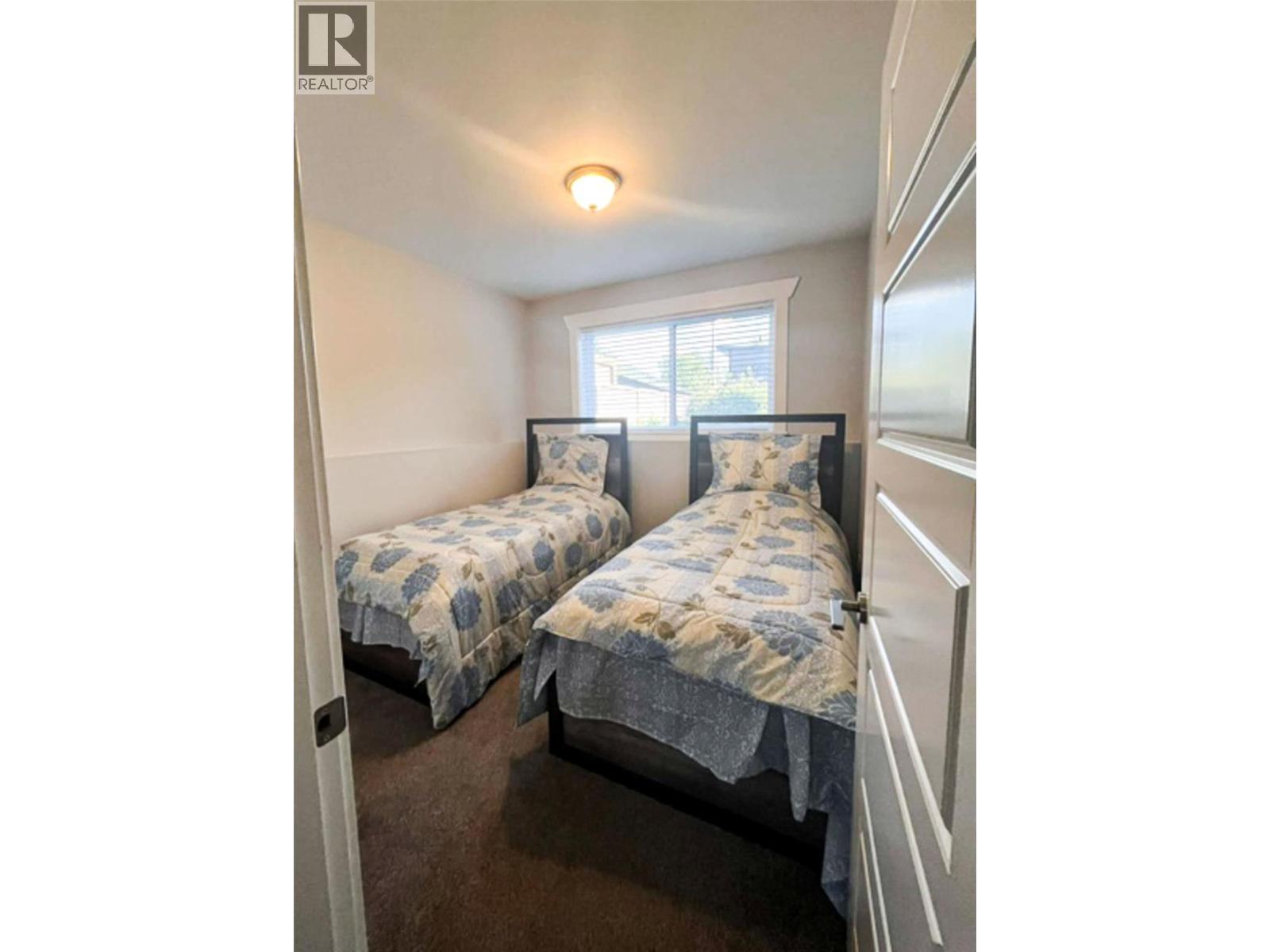 Suite Bedroom - 1941 Poplar Lane, Revelstoke, BC